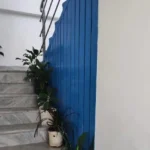 4 BHK Villa Casa De Santorini Varsoli Alibaug Staircase Landing With Blue Accent Wall