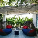 4 BHK Villa Casa De Santorini Varsoli Alibaug Covered Patio With Hanging Lounge Chairs