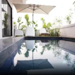 45 Saint Hills Riverfront Villas Khanand Karjat 3 BHK Personal Pool Area With Outdoor Deck Chairs And Greenery Surroundings