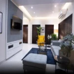 45 Saint Hills Riverfront Villas Khanand Karjat 3 BHK Elegant Living Area Featuring Sofa Seating And Designer Television Unit