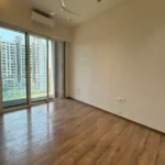 5 BHK Windsor Grande Oshiwara Rental Bedroom With Wooden Flooring