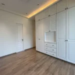 5 BHK Windsor Grande Oshiwara Rental Bedroom With Tall Wardrobe