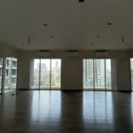Alt Text: 5 BHK Windsor Grande Oshiwara Rental Living Room With Wide Windows