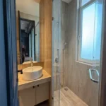 5 BHK Windsor Grande Oshiwara Rental Vanity Bathroom With Glass Shower