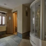 6 BHK Villa Ribandar Panjim North Goa Bathroom With Glass Shower Enclosure Sink And Modern Fittings