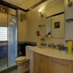 6 BHK Villa Ribandar Panjim North Goa Bathroom With Modern Design Sink Storage And Shower Area
