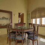 6 BHK Villa Ribandar Panjim North Goa Dining Area With Wooden Table Chairs And Interior Design