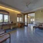 6 BHK Villa Ribandar Panjim North Goa Open Lounge Area With Chairs Tables And Spacious Interior Design