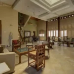 6 BHK Villa Ribandar Panjim North Goa Living Area With Open Layout Staircase And Premium Interior Design