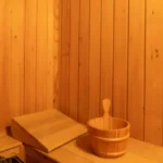 6 BHK Villa Ribandar Panjim North Goa Sauna Room With Wooden Interiors Seating Area And Wellness Space