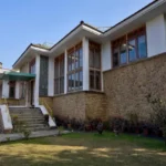 6 BHK Villa Ribandar Panjim North Goa Villa Exterior With Stone Facade Garden Lawn And Entrance Steps