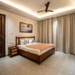 8 BHK Villa Luxe Riviera Candolim Goa Cove Lit Ceiling Wood Bed Beach Artwork Bedroom