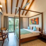 8 BHK Villa Luxe Riviera Candolim Goa Four Poster Bed Balcony View Colourful Art Bedroom