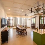 8 BHK Villa Luxe Riviera Candolim Goa Green Island Wood Door Open Plan Dining Living Room