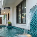 8 BHK Villa Luxe Riviera Candolim Goa Waterfall Feature Flamingo Float Teal Mosaic Pool