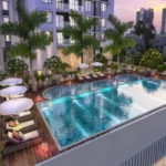Icon By Merx Jacob Circle Mahalaxmi 3 BHK Swimming Pool Deck With Luxury Lounge Seating Palm Trees And Premium Outdoor Design