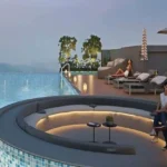 Icons 71 Union Park Sky Deck Lounge With Curved Seating Planters And Elevated City Views