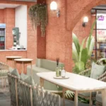 La Wisteria Siolim North Goa Premium Cafe Lounge Area With Elegant Seating Decor And Refreshment Counter