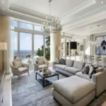 Lakhani Empire Dynasty Panch Pakhadi Thane 3 BHK Elegant Living Room Interior With Double Height Ceiling Large Windows And Dining Space