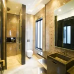 Promesa Fremont Lalbaug Parel 3 BHK Luxury Bathroom With Designer Vanity Mirror Paneling And Gold Finishes