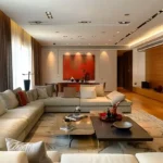 Promesa Fremont Lalbaug Parel 3 BHK Spacious Living Room With Dining Space Wooden Finishes And Premium Seating