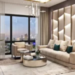 Raunak Centrum Sion 3 BHK Living Area With Large Glass Windows Comfortable Seating And Cityscape View