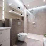 Raunak Centrum Sion 3 BHK Bathroom With Glass Shower Partition Wall Mounted WC And Vanity Counter