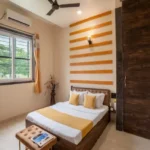 Rishabh Villa Waksai Lonavala 6 BHK Bedroom Interior With Compact Design Natural Light Window View Modern Furniture And Clean Layout