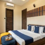 Rishabh Villa Waksai Lonavala 6 BHK Bedroom Interior With Modern Furniture Cozy Bedding Spacious Layout Warm Lighting And Elegant Design