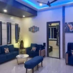 Rishabh Villa Waksai Lonavala 6 BHK Living Room Interior With Modern Seating Luxury Design Spacious Layout Large Windows And Scenic View