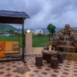 Rishabh Villa Waksai Lonavala 6 BHK Private Pool Night View With Ambient Lighting Luxury Amenity Outdoor Seating Water Reflections And Evening Atmosphere