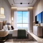 Romell Ariana IC Colony Borivali West 2 BHK Cozy Bedroom With Modern Decor Soft Lighting And Skyline View