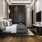 Romell Espalier Navpada Vile Parle East 3 BHK Luxury Bedroom Interior With TV Unit And Wooden Flooring