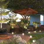 SKG One Uttam Uttam Society Chembur Garden Seating Area With Pergola Lighting Greenery And Outdoor Lounge