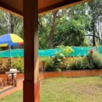 Saudades Beach Bungalow Candolim Goa 3 BHK Lawn Colourful Umbrella Tropical Garden
