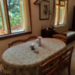 Saudades Beach Bungalow Candolim Goa 3 BHK Oval Table Garden View Window Dining Room