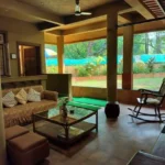 Saudades Beach Bungalow Candolim Goa 3 BHK Rocking Chair Pillar Open Garden Verandah