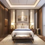 Shelton Elite Gulmohar Road Juhu 3 BHK Elegant Bedroom With Warm Lighting Upholstered Bed And Wooden Panels