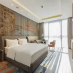 Sheth Vasant Lawns Thane 3 BHK Bedroom With Large Windows Balcony Access And Modern Interior Finish