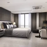 Sugee Vaayu Ashok Nagar Mulund West 4 BHK Elegant Luxury Bedroom With Large Window And Sofa Seating