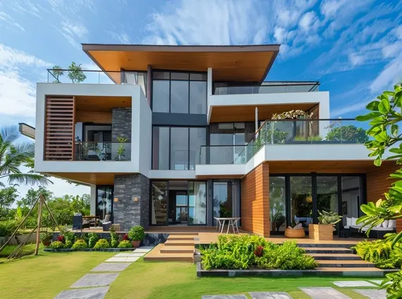 The Chapter Vaijali Alibaug Modern Villa Exterior With Glass Balconies Landscaped Lawn And Clean Facade