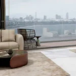 The Manor Babulnath Dadi Seth Lane Malabar Hill 4 BHK Balcony Seating Area With Glass Railing City View And Modern Outdoor Setup