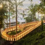 The Manor Babulnath Dadi Seth Lane Malabar Hill 4 BHK Elevated Walkway With Scenic City View Lush Green Surroundings And Ambient Lighting