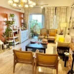 3 BHK Imperial Heights Goregaon West Cane Chair Rattan Hanging Egg Chair Orange Accent Wall Eclectic Living Room