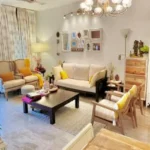 3 BHK Imperial Heights Goregaon West Cream Sofa Yellow Cushion Globe Chandelier Vintage Frame Wall Eclectic Living Room