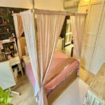 3 BHK Imperial Heights Goregaon West Pink Canopy Bed Botanical Wallpaper White Wardrobe Study Desk Bedroom