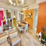 3 BHK Imperial Heights Goregaon West Rustic Wood Dining Table Magenta Door Orange Accent Wall Distressed Cabinet Dining Room