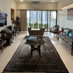 3 BHK Kalpataru Solitaire Juhu Scheme Persian Rug Teak Furniture Cityview Living Room