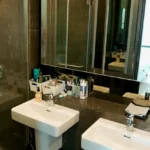 4 BHK Lodha Marquis Lower Parel Dark Marble Double Sink Mirror Cabinet Bathroom