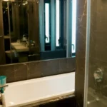 4 BHK Lodha Marquise Lower Parel Dark Marble Double Sink Mirror Cabinet Bathroom